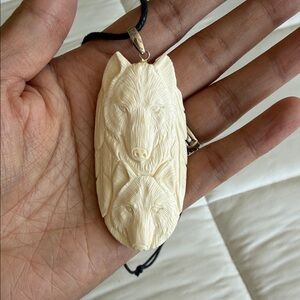 Carved Wolf Pendant Necklace